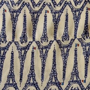 Express Eiffel Tower print sleeveless button up top